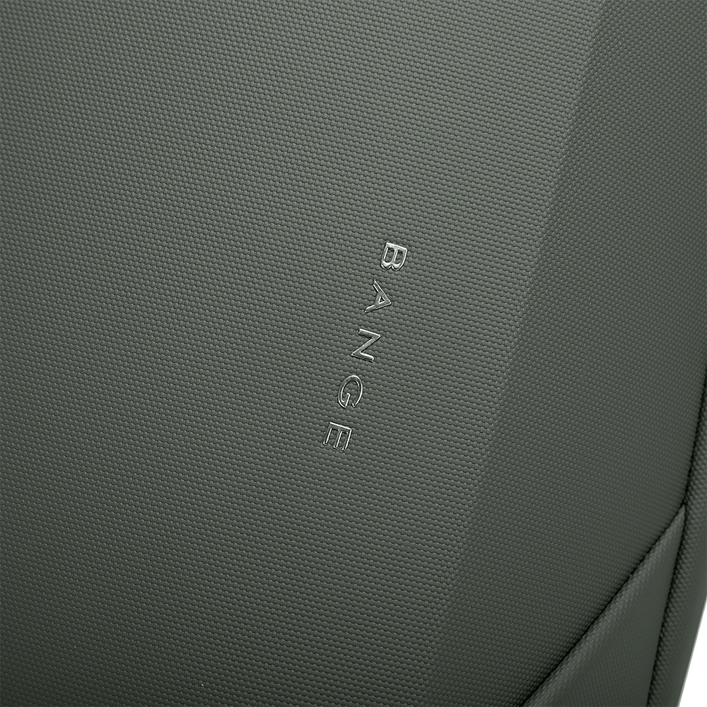 Close-up of BANGE logo on textured green backpack front panel with durable water-resistant material.