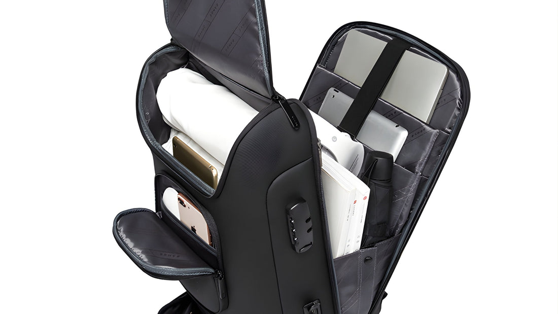 BANGE 7216 Plus backpack with its top compartment and front pocket open, holding a phone, clothes and a laptop