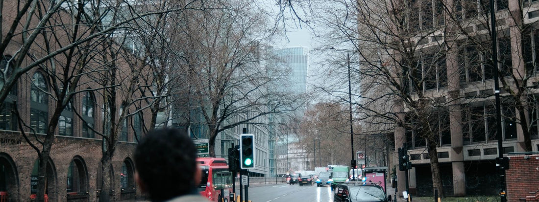 Person wearing a backpack walking on a city street