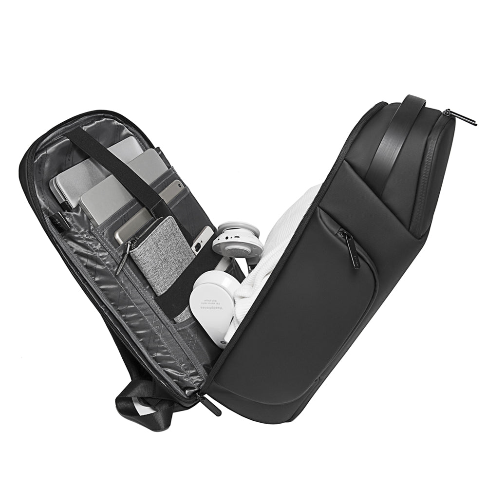 BANGE 7277 Astraq black backpack open showing organized interior compartments on a white background