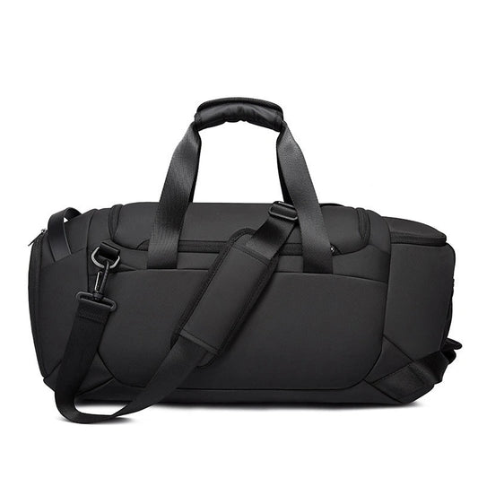 Back view of the BANGE BG-2378 black duffel bag with padded structure, top handles, and detachable shoulder strap on a white background