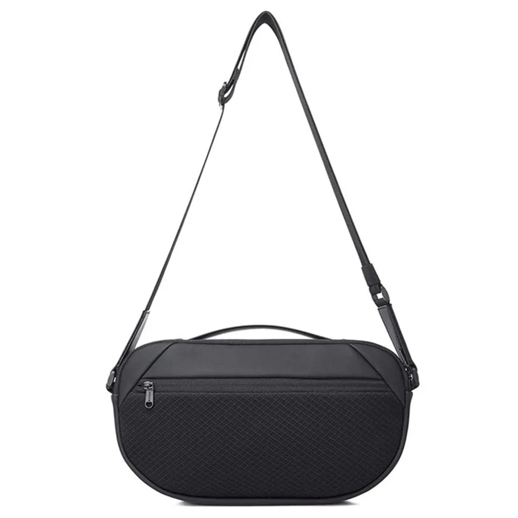 Back view of the BANGE BG-7308 crossbody shoulder bag with textured front panel, adjustable strap, compact horizontal design, and minimalist black finish on a white background