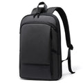 Front view of black BANGE BG-77115 Ontra backpack with slim minimalist design, smooth front panel, and padded shoulder straps