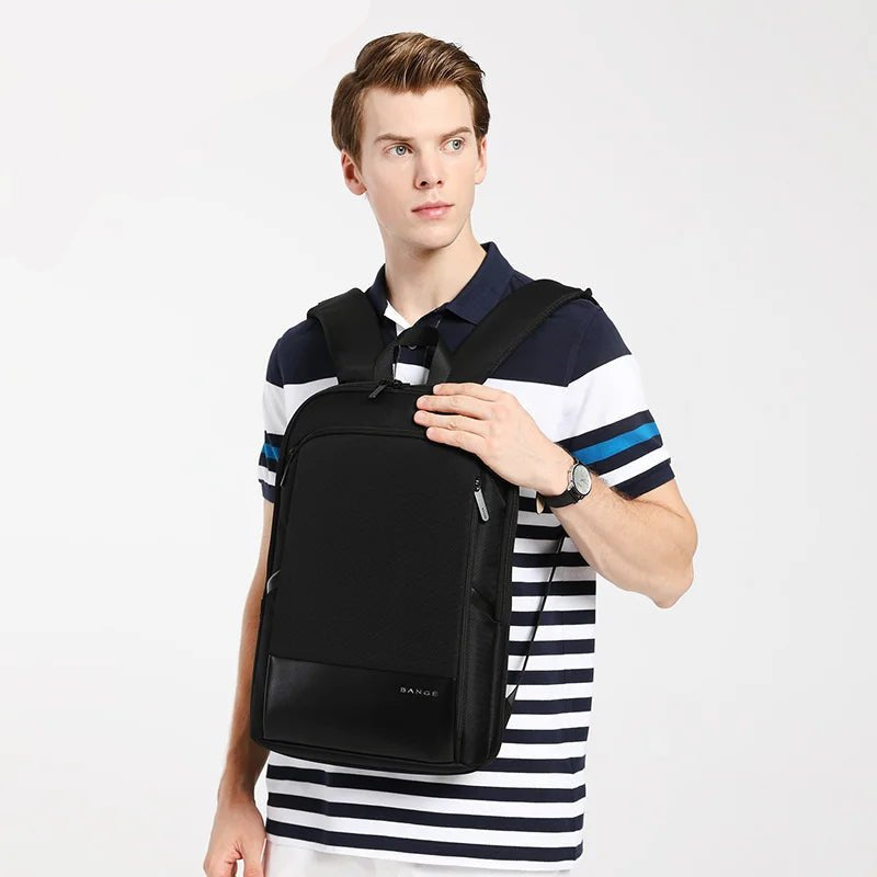 Lifestyle view of black BANGE BG-77115 Ontra backpack worn on the front, showing slim profile, structured design, and everyday urban use