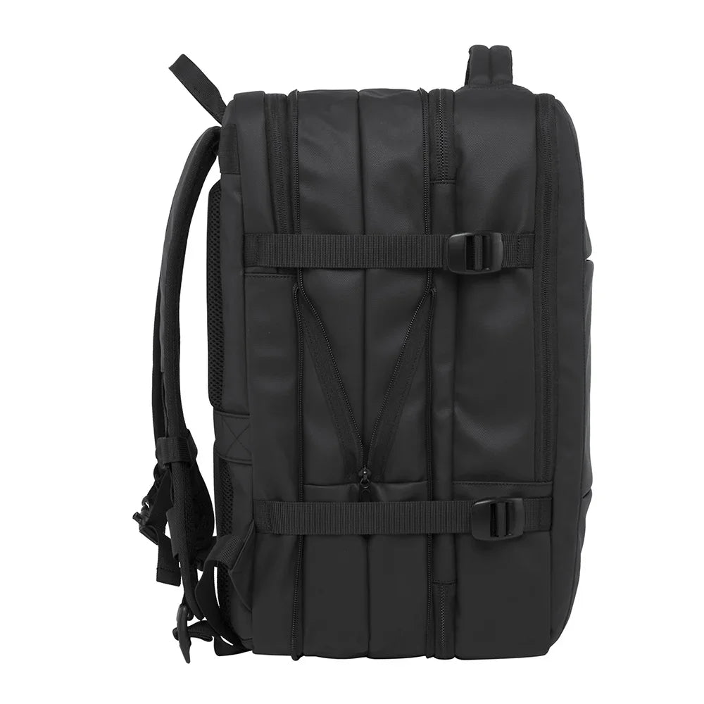 Side view of a black BANGE Coreva travel backpack showing compression straps on a white background