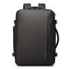 Front view of BANGE 1909-8 model expandable travel backpack with minimalist black design and streamlined hard-shell exterior